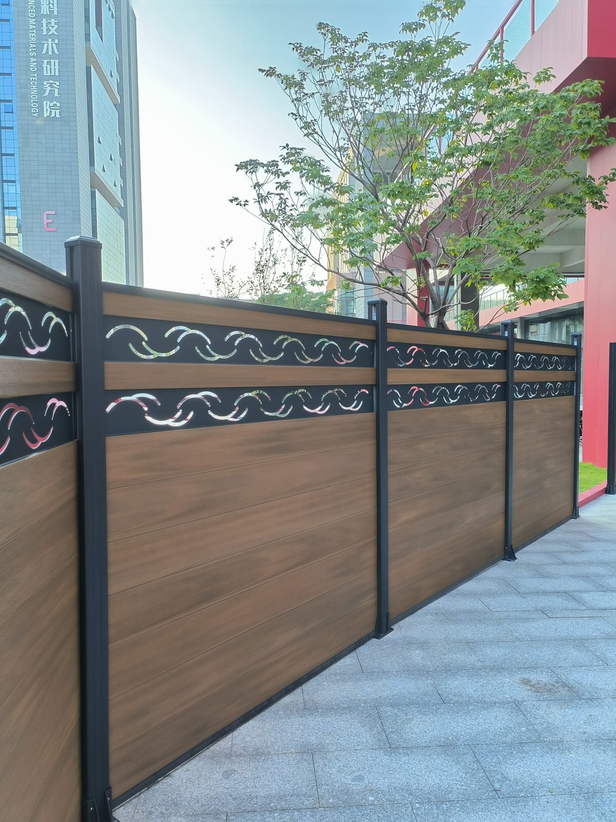 WPC fence installation with decorative aluminum panel